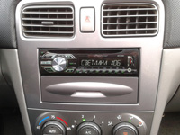 Фотография установки магнитолы Pioneer DEH-1500UBG в Subaru Forester SG